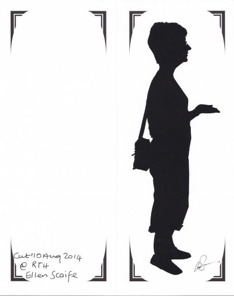 
        Full length cut silhouette of woman facing right, bag over shoulder